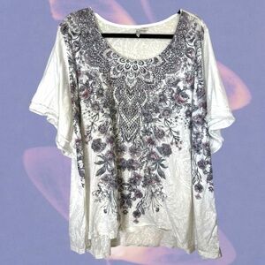 White and purple floral and paisley print top with a flowy butterfly sleeve